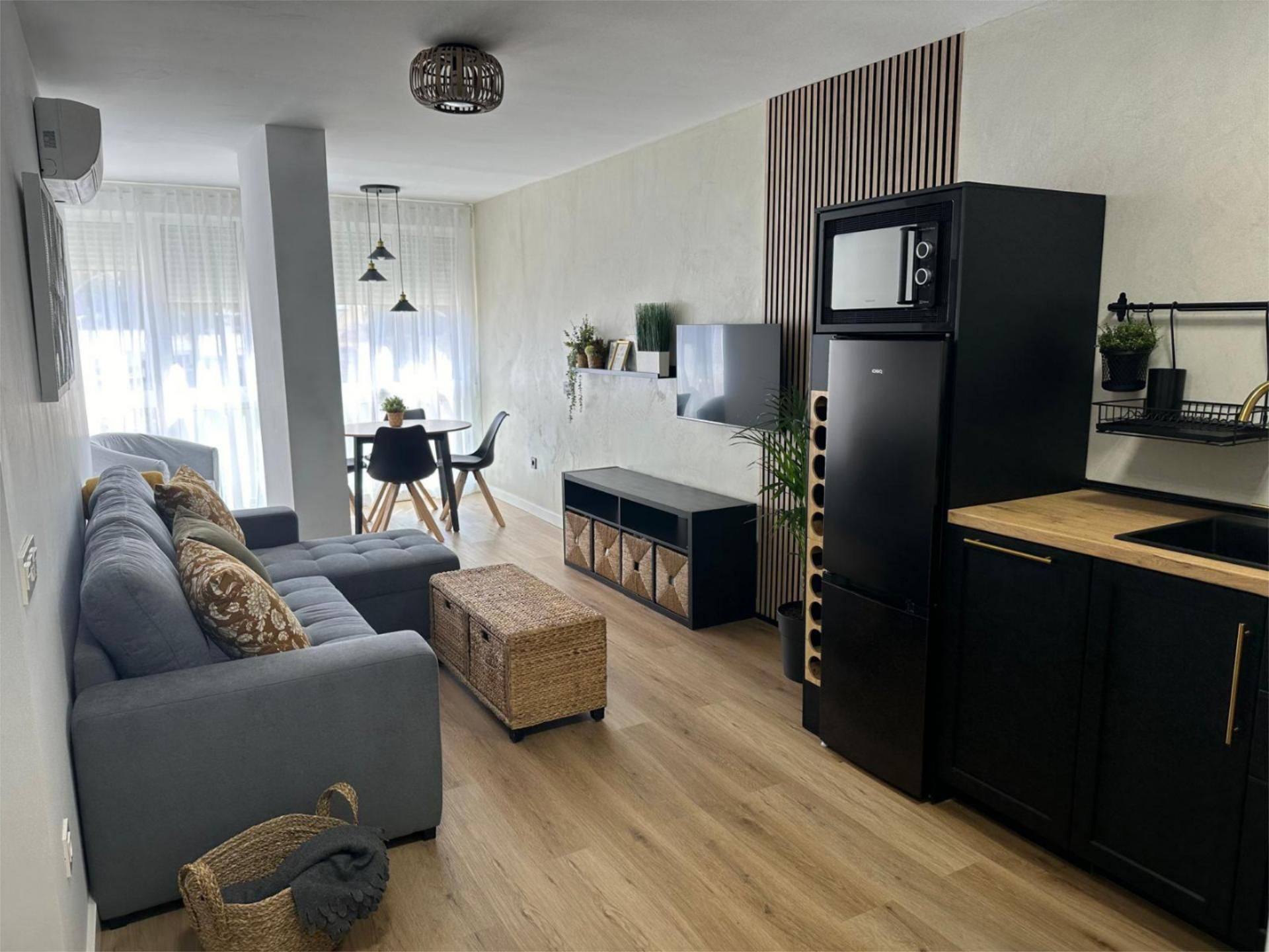 Living room of Apartment to rent in Benalmádena  with Air Conditioner