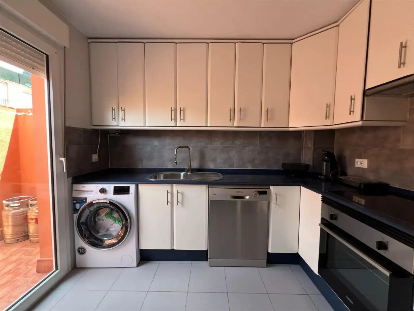 Kitchen of Flat for sale in Chiclana de la Frontera  with Air Conditioner, Private garden and Terrace
