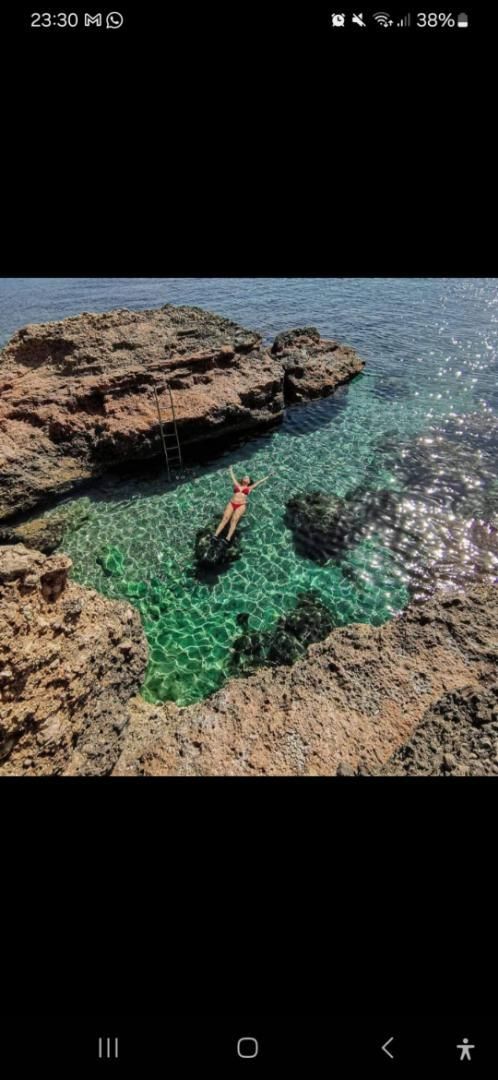 Piscina de Casa adosada en venda en L'Ametlla de Mar  amb Aire condicionat, Jardí privat i Parquet