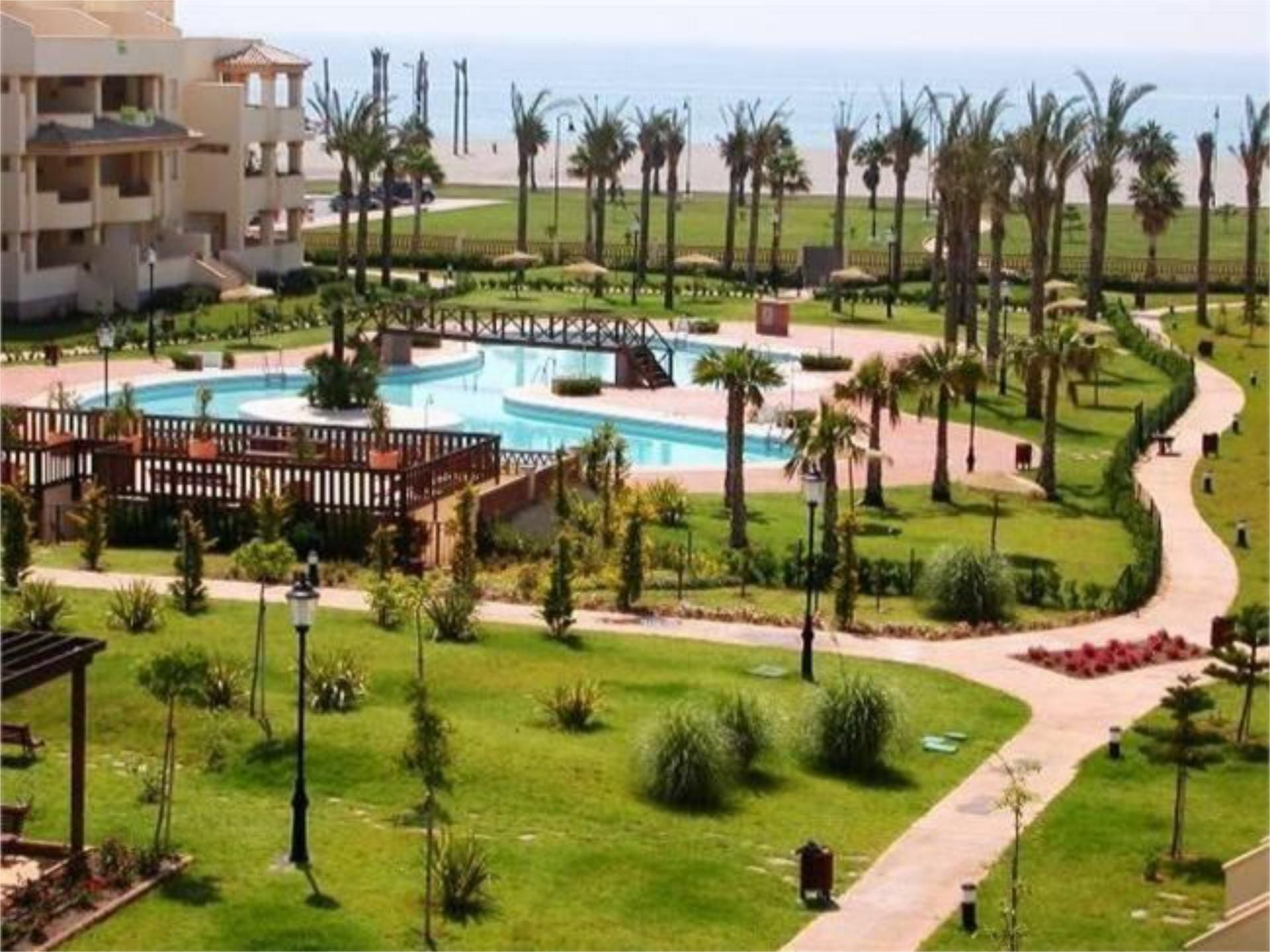 Swimming pool of Flat to rent in Roquetas de Mar  with Air Conditioner, Heating and Private garden