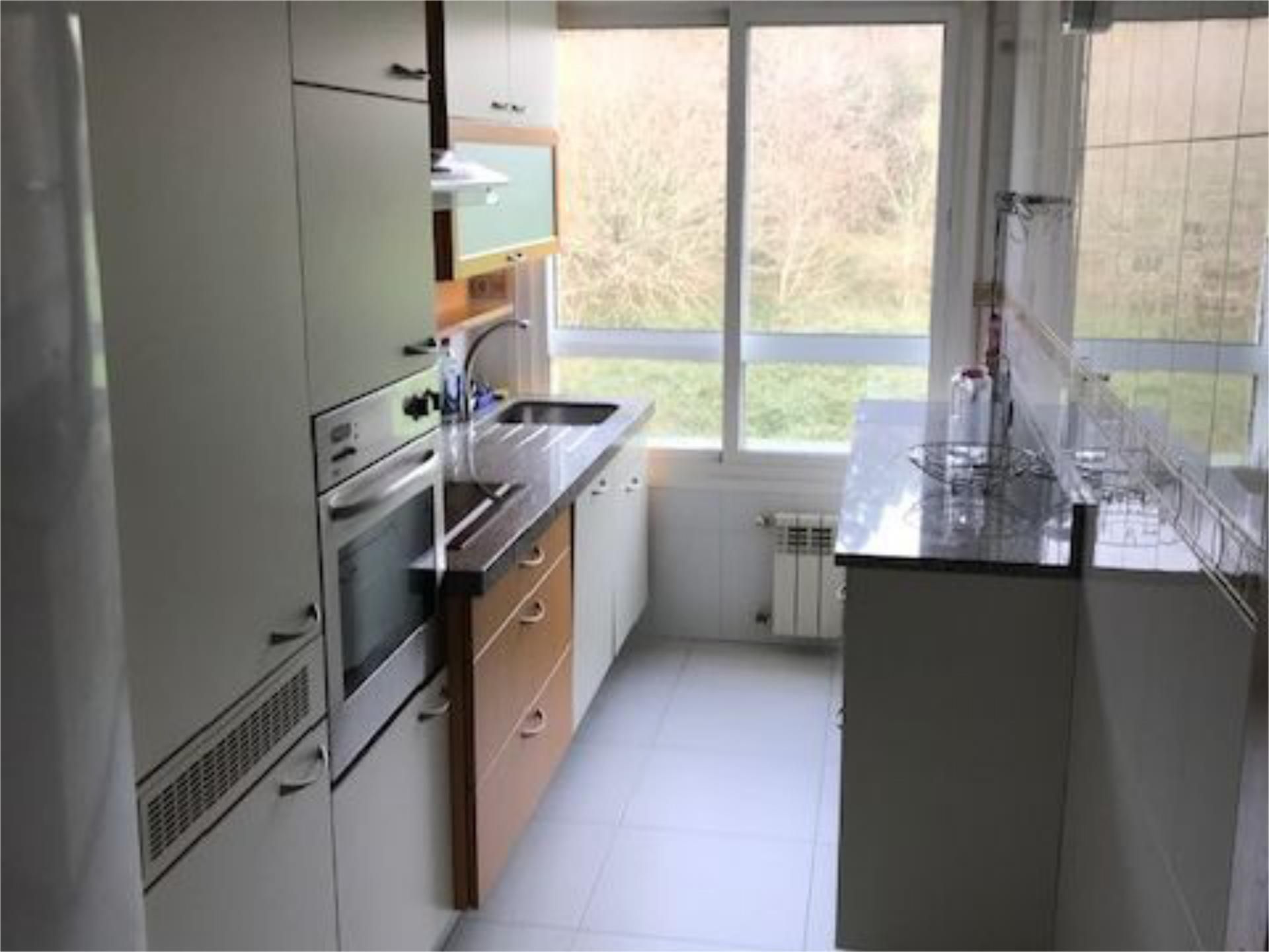 Kitchen of Flat to rent in Santiago de Compostela   with Heating, Parquet flooring and Storage room