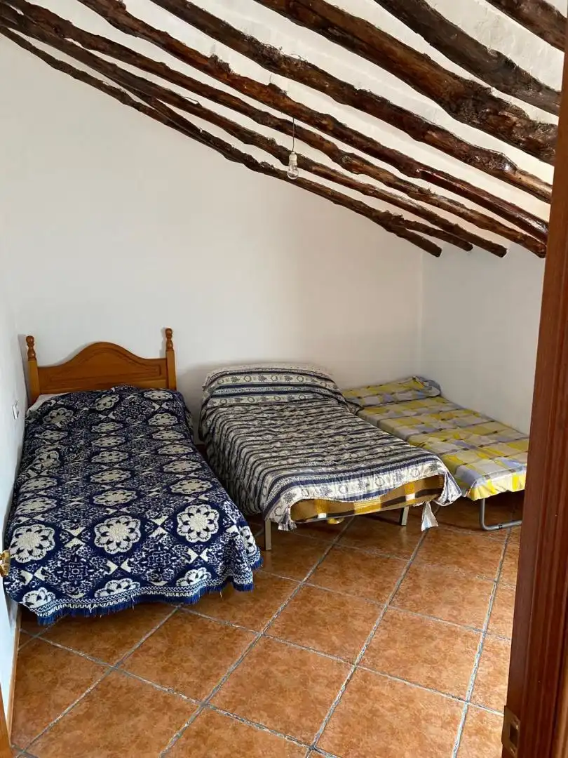 Habitación de Casa adosada en venta en Periana con Jardín privado, Terraza y Amueblado
