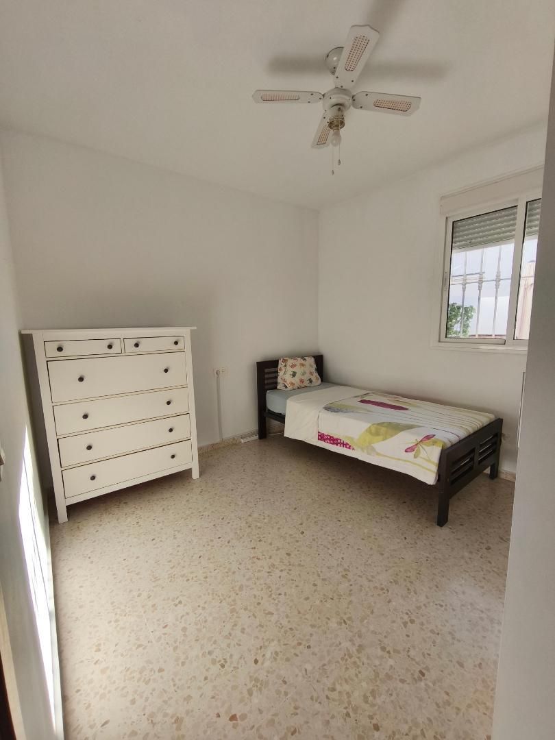 Dormitori de Casa adosada per a compartir en Almensilla amb Aire condicionat, Jardí privat i Terrassa