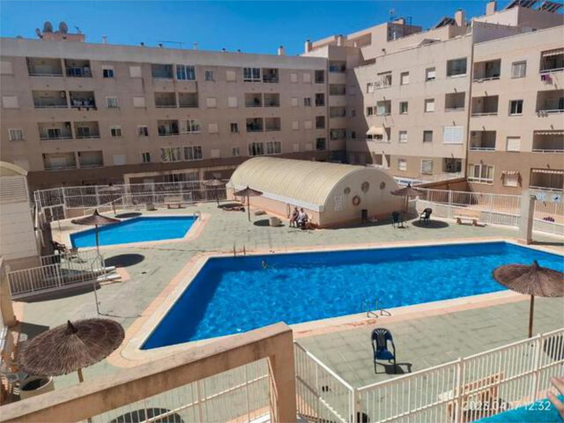Swimming pool of Apartment to rent in Torrevieja  with Heating, Private garden and Terrace