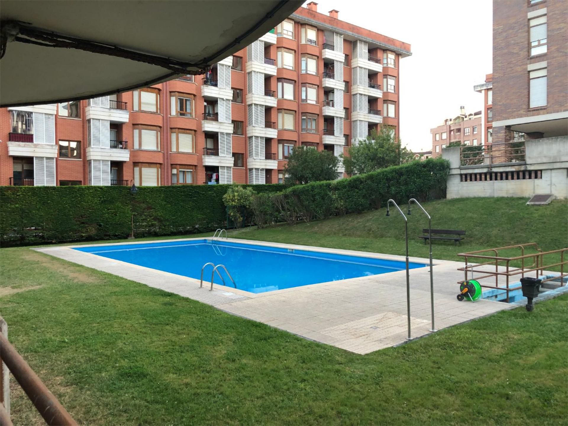Swimming pool of Flat to rent in Castro-Urdiales  with Heating, Private garden and Parquet flooring