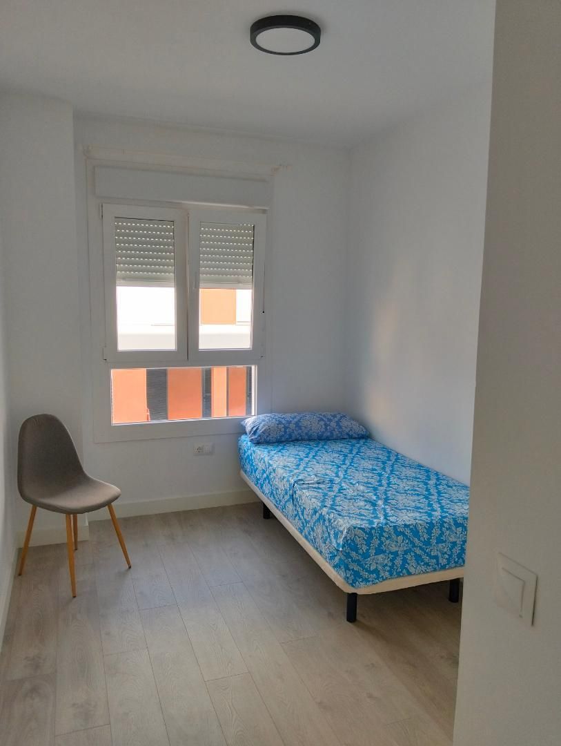 Bedroom of Flat to share in Málaga Capital  with Air Conditioner, Private garden and Terrace