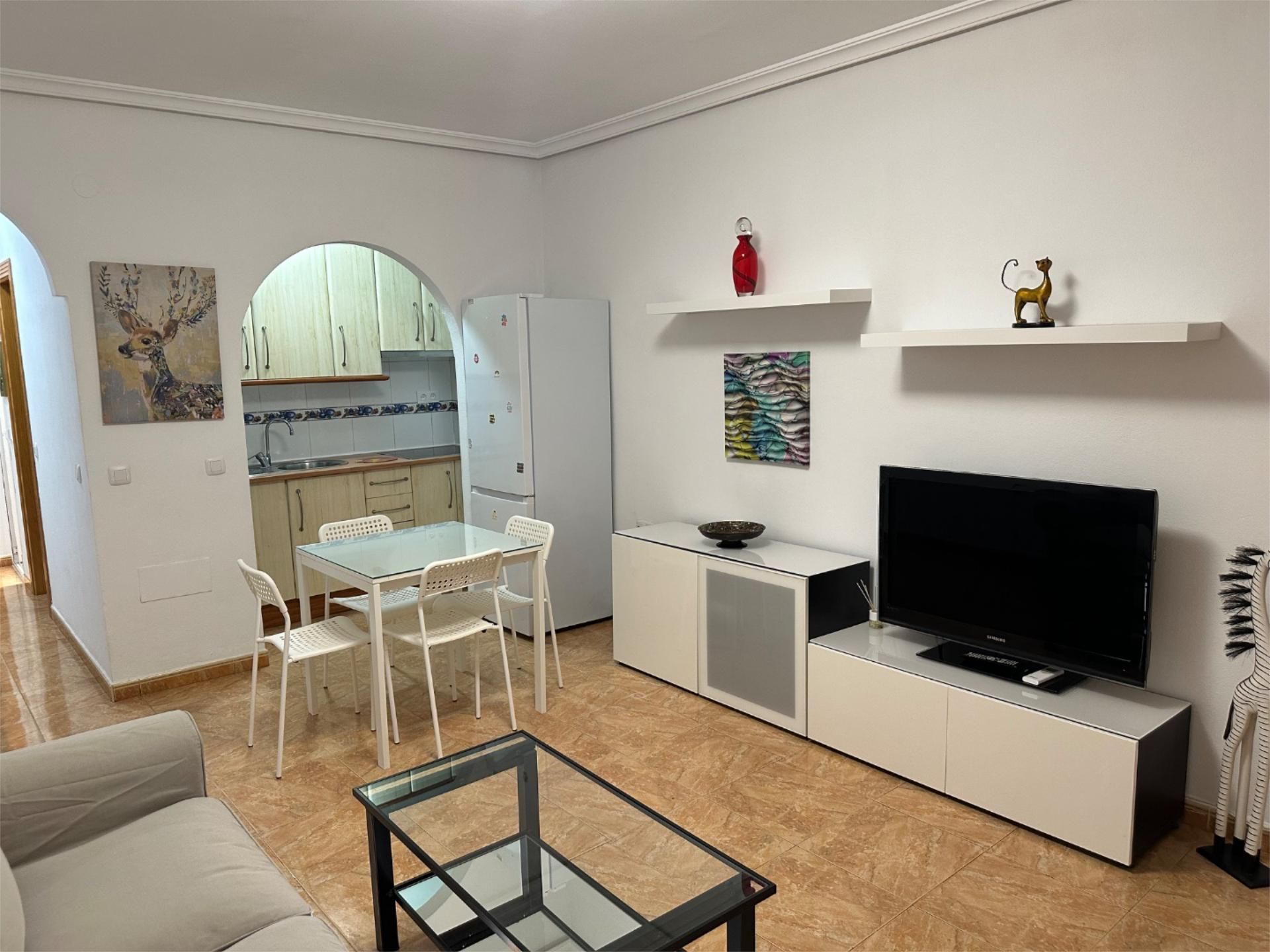 Sala d'estar de Casa adosada en venda en  Almería Capital amb Aire condicionat, Calefacció i Moblat