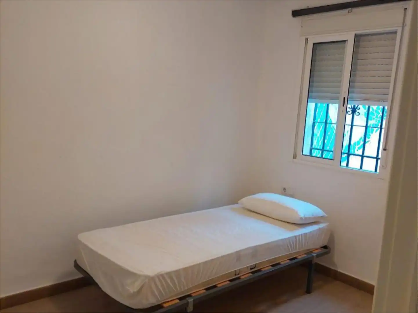 Dormitori de Apartament de lloguer en Sevilla amb Aire condicionat, Calefacció i Terrassa