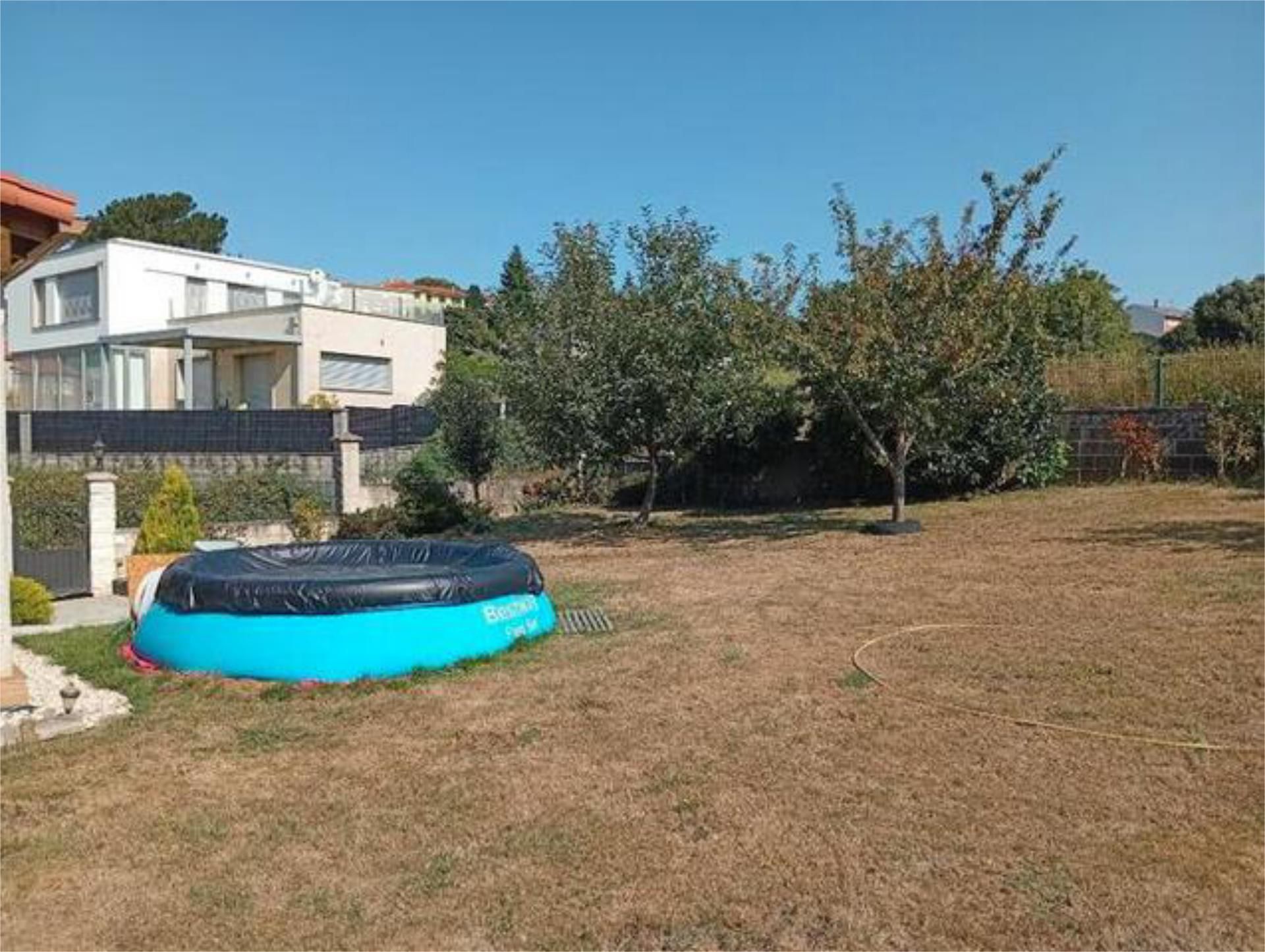 Jardí de Casa adosada en venda en Carral amb Terrassa