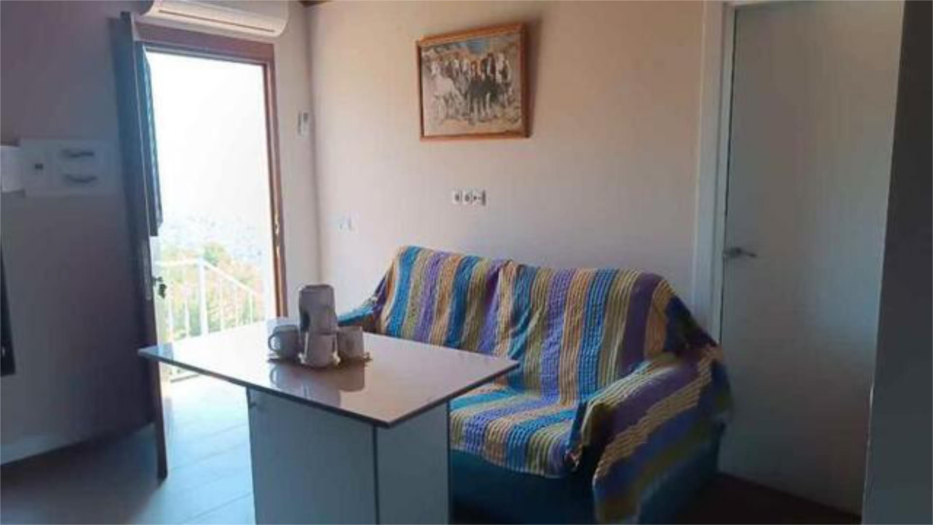 Bedroom of Flat to share in Yunquera  with Heating, Private garden and Swimming Pool
