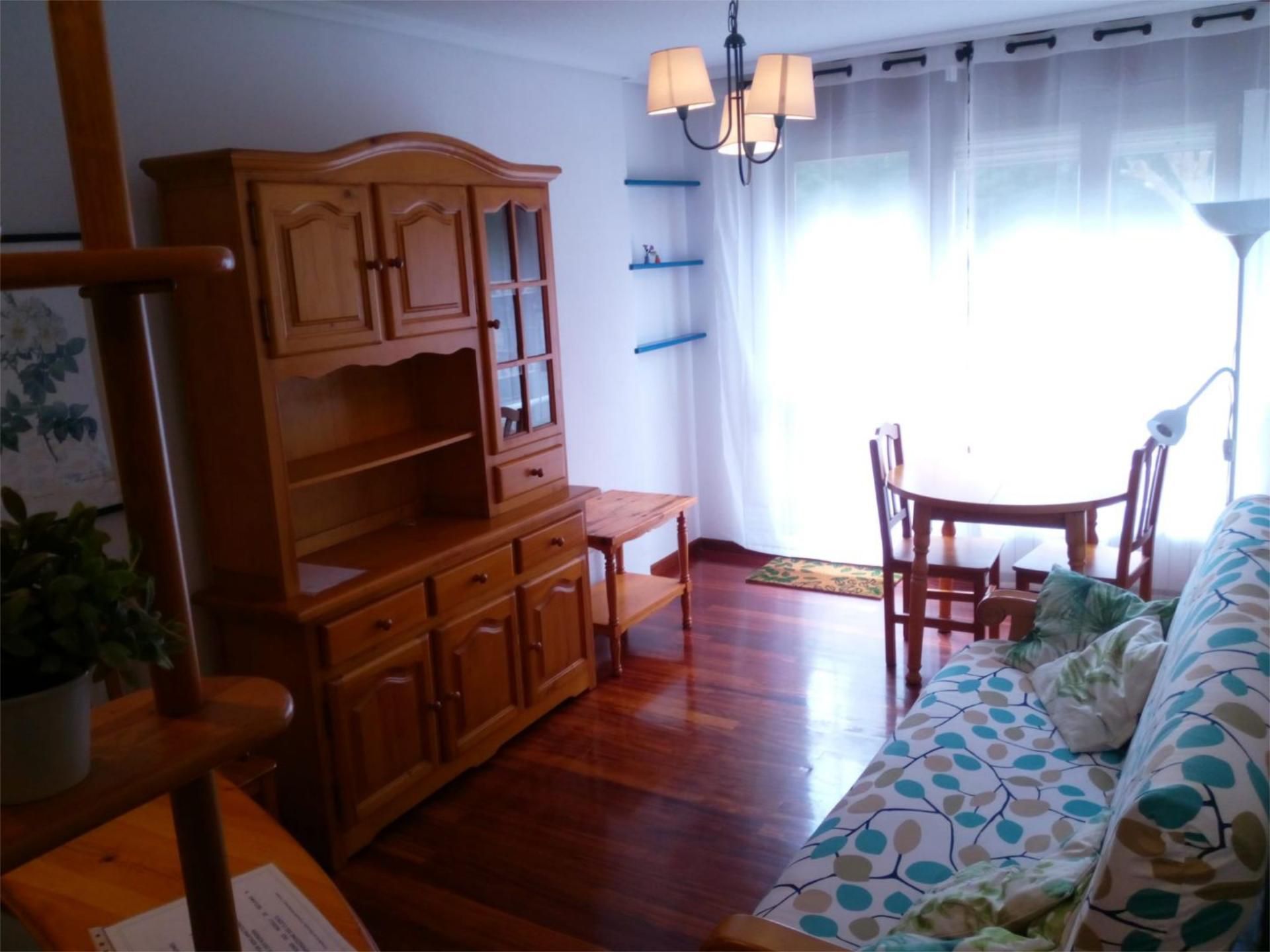 Dormitori de Apartament de lloguer en Suances amb Calefacció, Jardí privat i Parquet