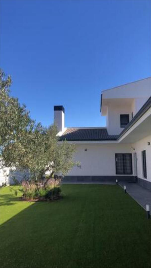 Exterior view of Single-family semi-detached for sale in Aljaraque  with Terrace and Swimming Pool