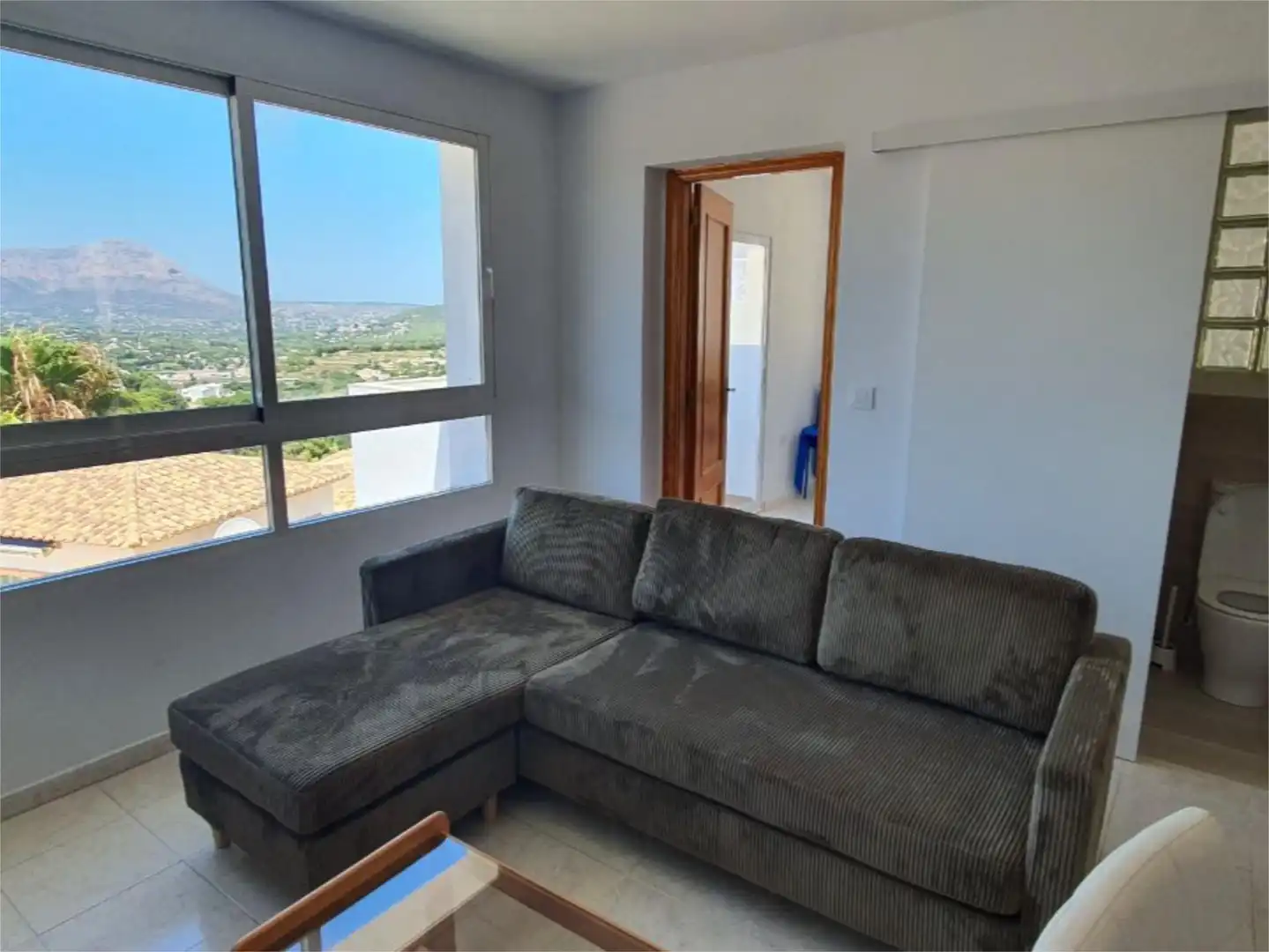 Casa adosada en venta en Urbanización las Mimosas, 19, Els Calistros - L'Assagador Sala de estar de Casa adosada en venta en Benitachell / El Poble Nou de Benitatxell con Calefacción, Jardín privado y Trastero