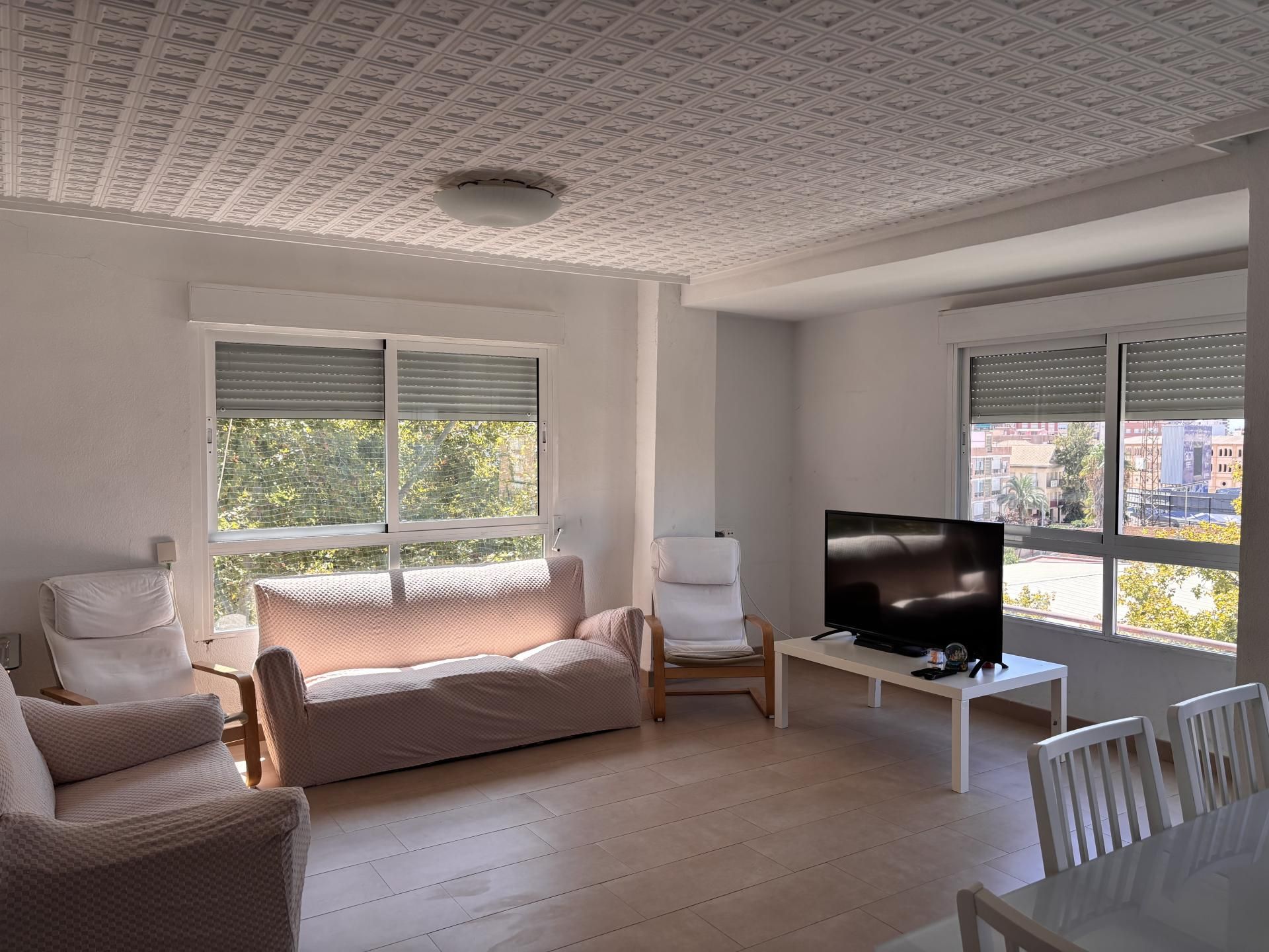 Sala de estar de Piso para compartir en  Murcia Capital con Aire acondicionado, Parquet y Terraza