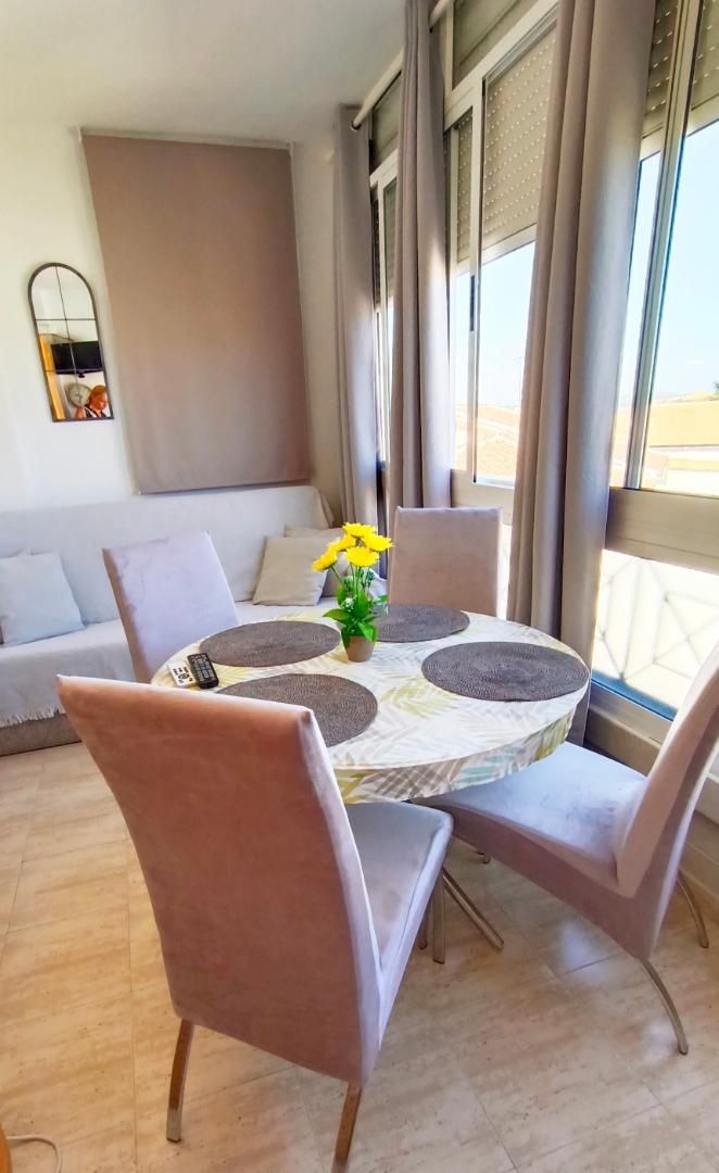 Dining room of Flat to rent in Torrevieja  with Air Conditioner, Private garden and Terrace