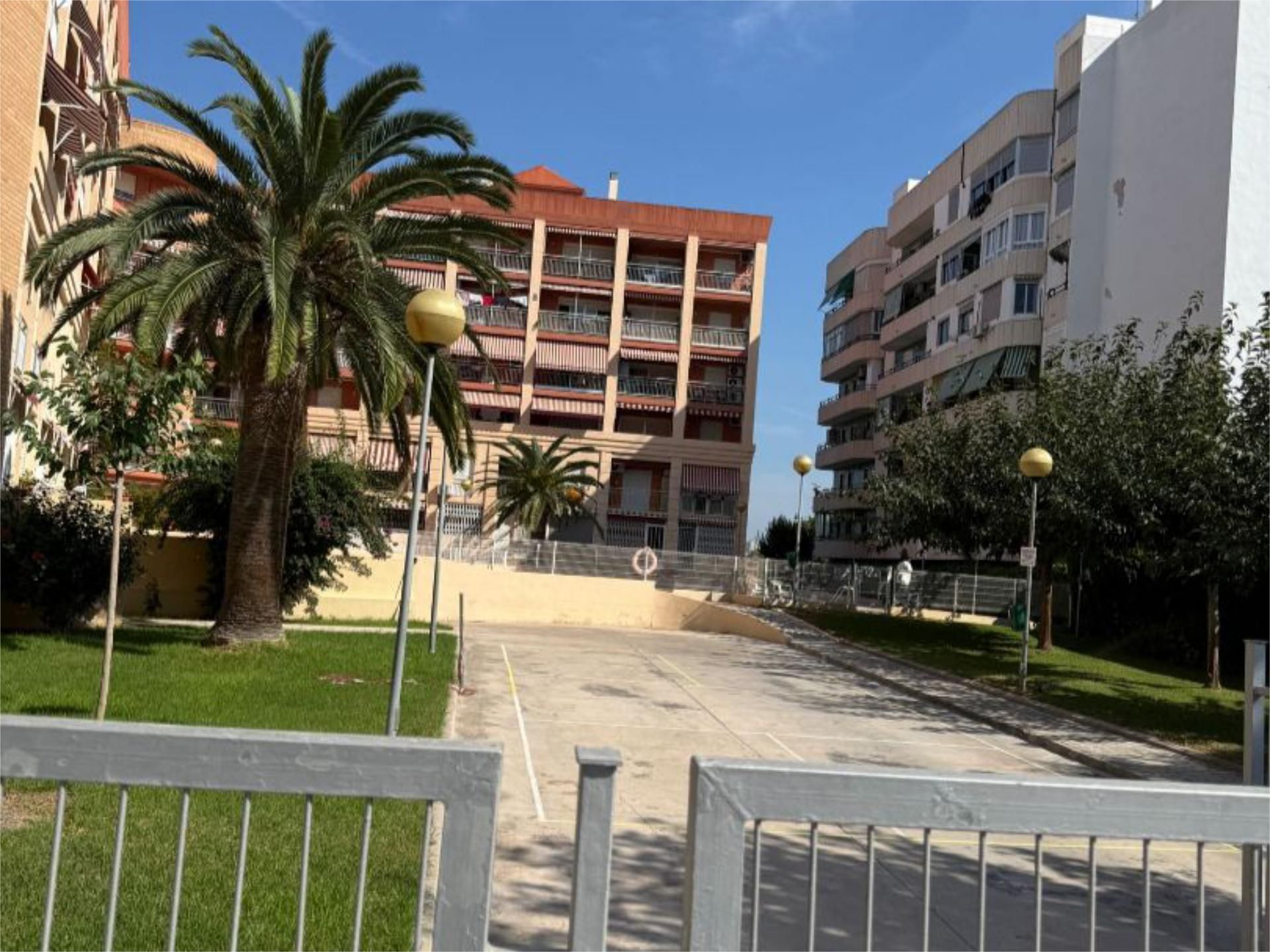 Parking of Duplex for sale in La Pobla de Farnals  with Air Conditioner, Terrace and Swimming Pool