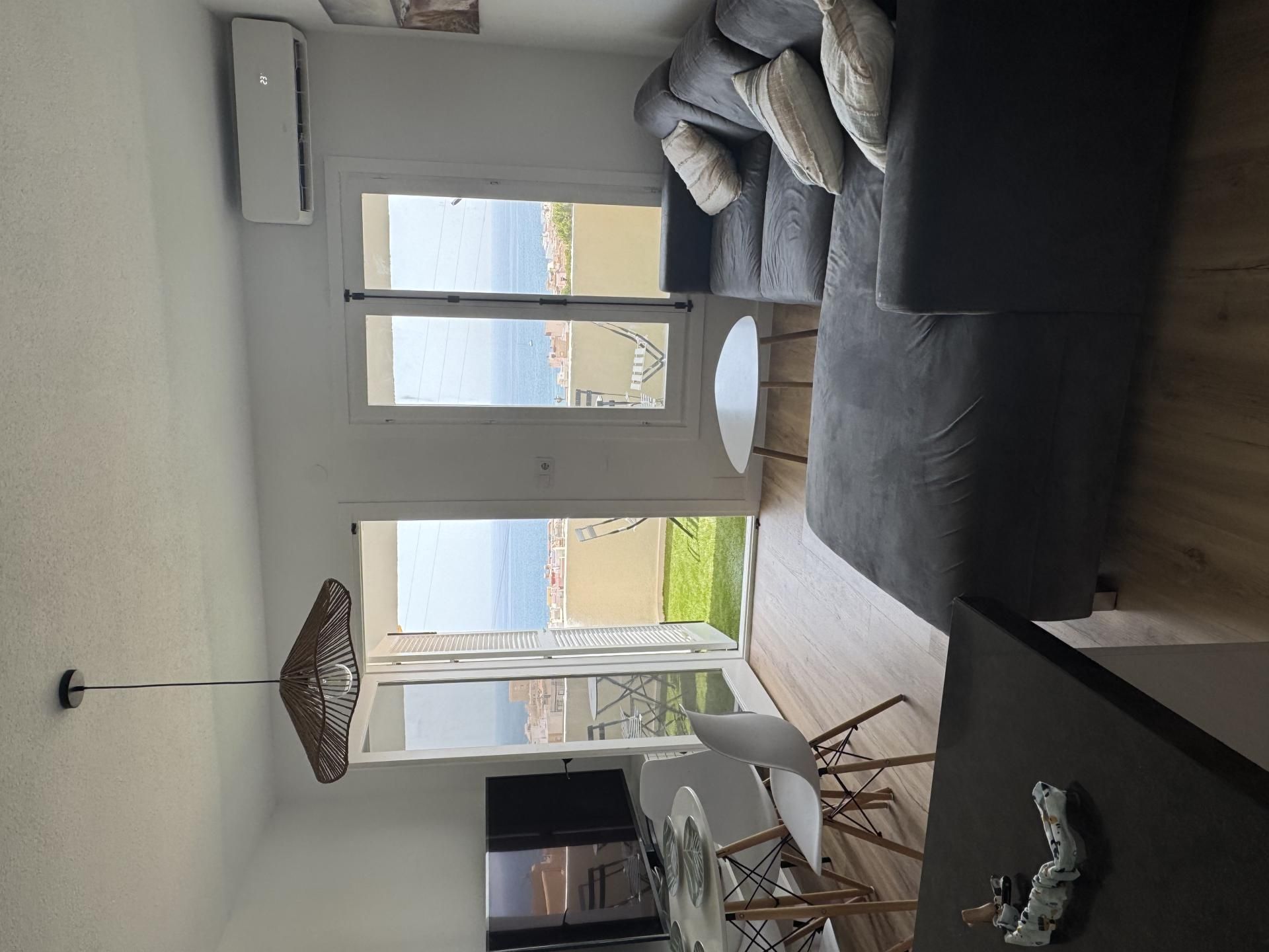 Living room of Flat to rent in Garrucha  with Air Conditioner, Heating and Private garden