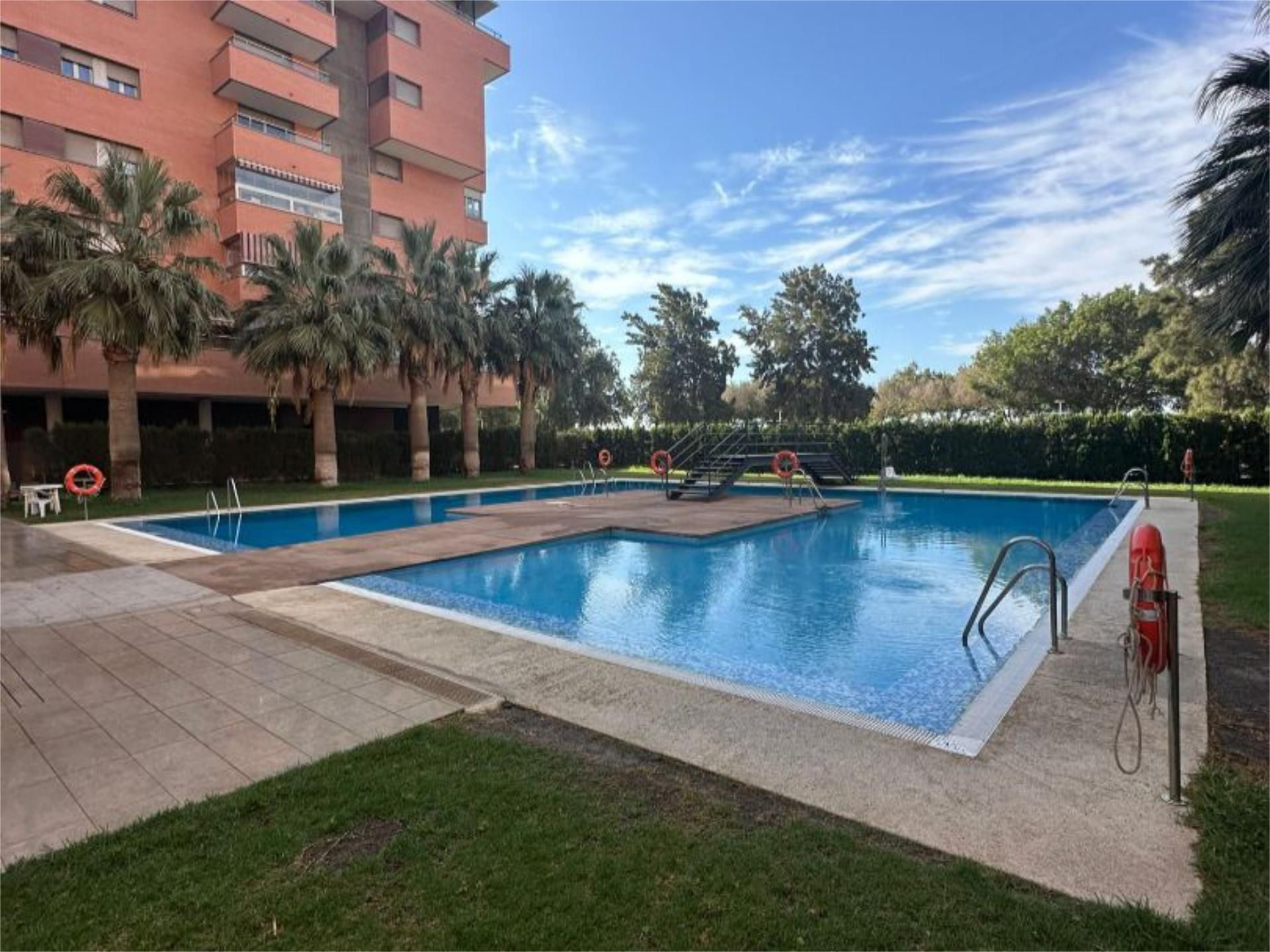 Swimming pool of Flat for sale in  Almería Capital  with Air Conditioner, Heating and Private garden