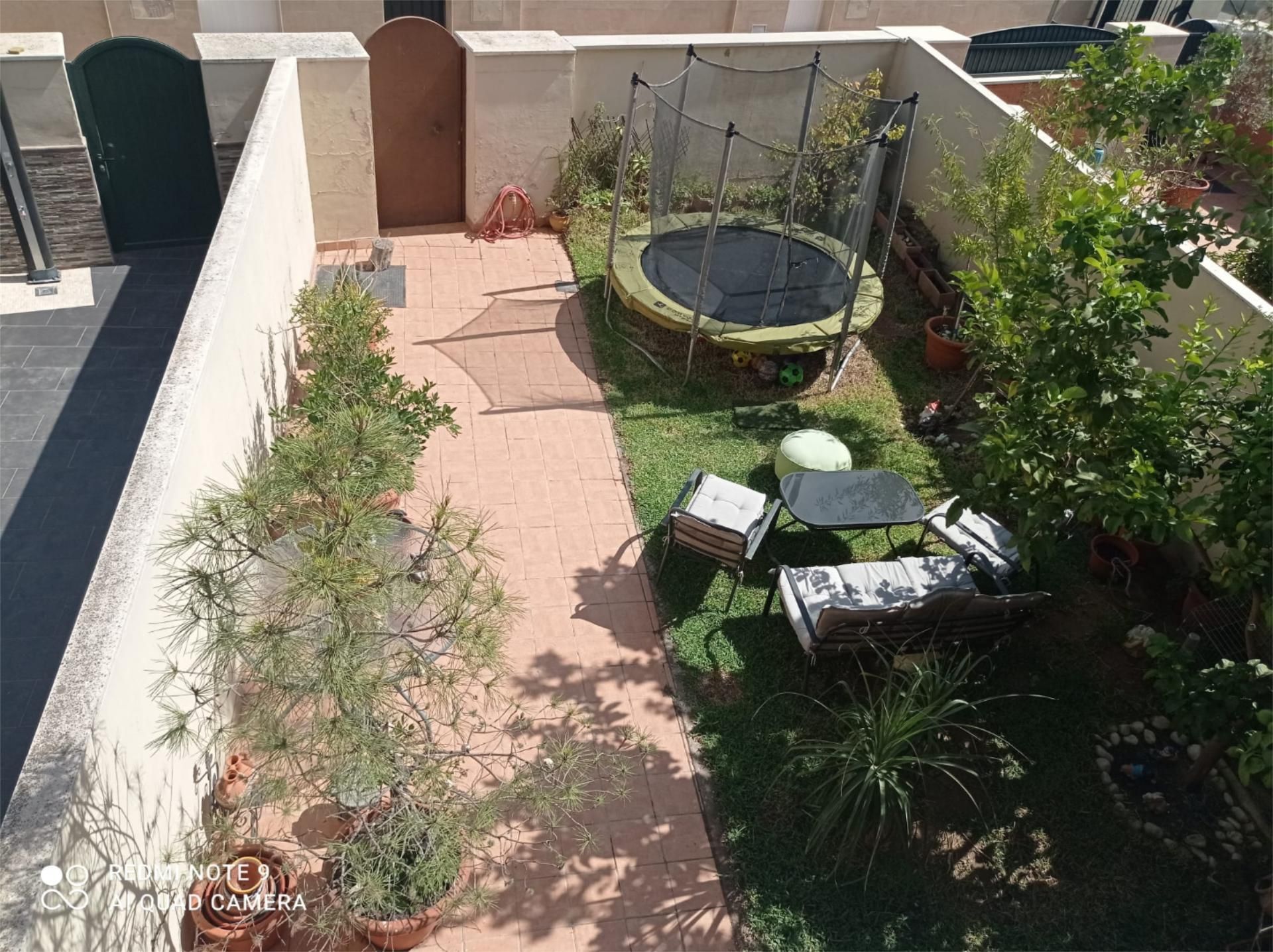 Terrace of Single-family semi-detached for sale in Coria del Río  with Air Conditioner, Private garden and Parquet flooring