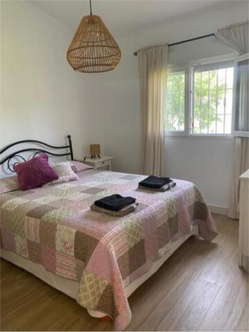 Dormitori de Casa adosada de lloguer en Chiclana de la Frontera amb Jardí privat, Piscina i Moblat