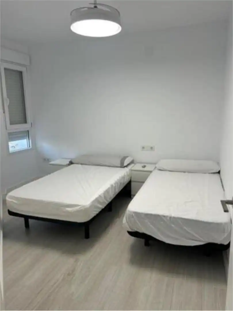 Wohnung zum Verkauf in Centro Schlafzimmer von Wohnung zum Verkauf in Salobreña mit Privatgarten, Terrasse und Schwimmbad