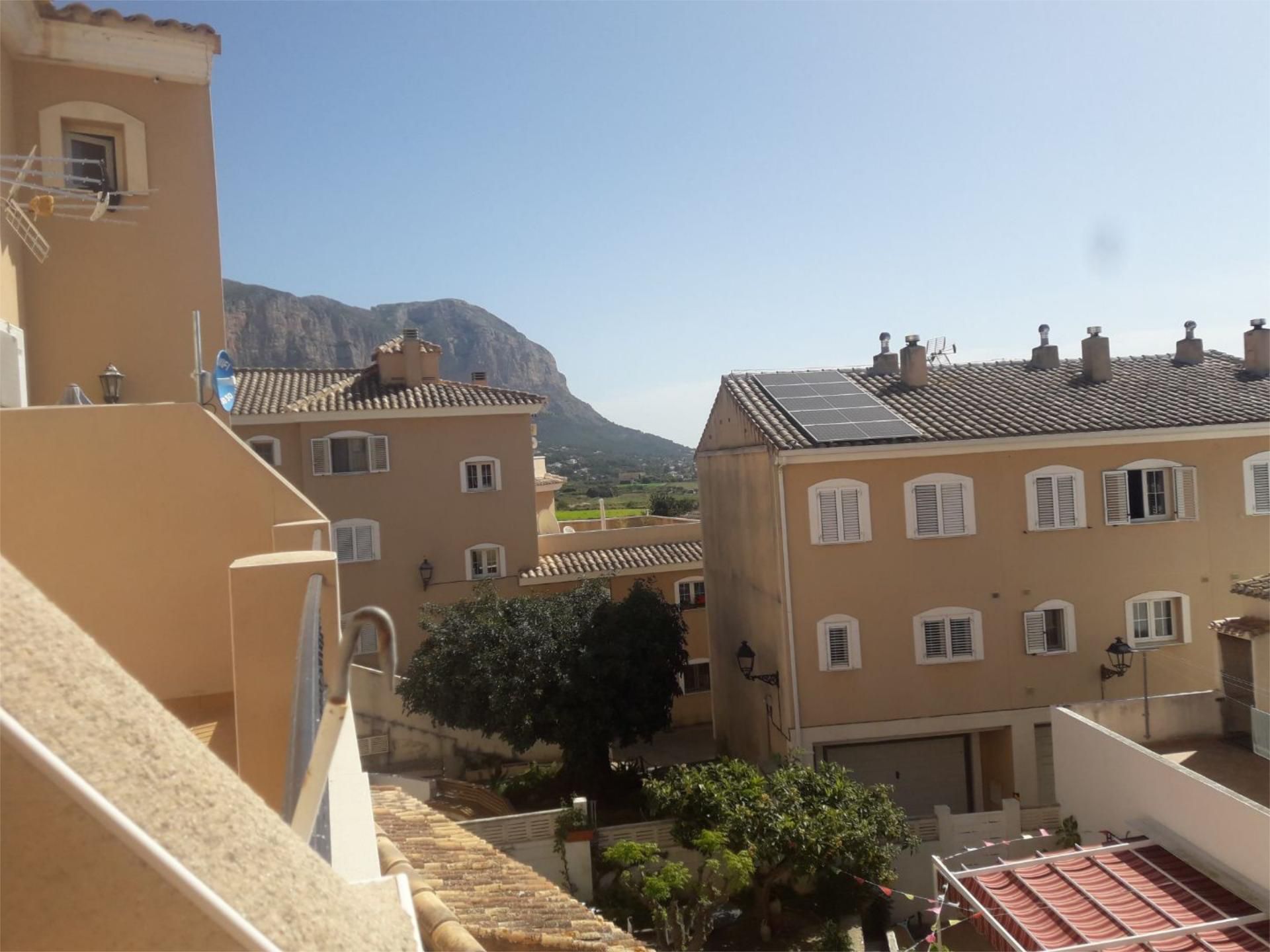 Exterior view of Single-family semi-detached for sale in Dénia  with Air Conditioner, Swimming Pool and Balcony