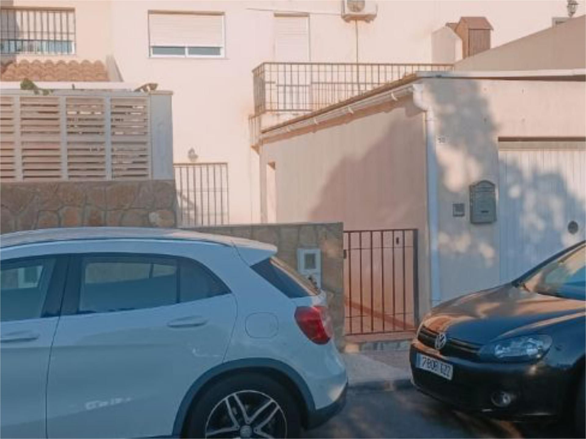 Aparcament de Casa adosada en venda en Roquetas de Mar amb Aire condicionat, Terrassa i Piscina