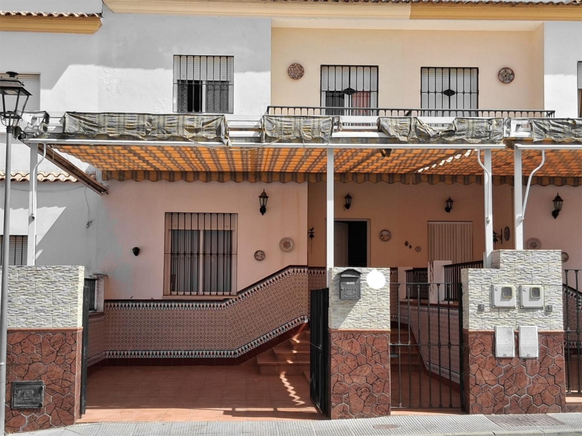 Exterior view of Single-family semi-detached for sale in El Real de la Jara  with Air Conditioner and Terrace