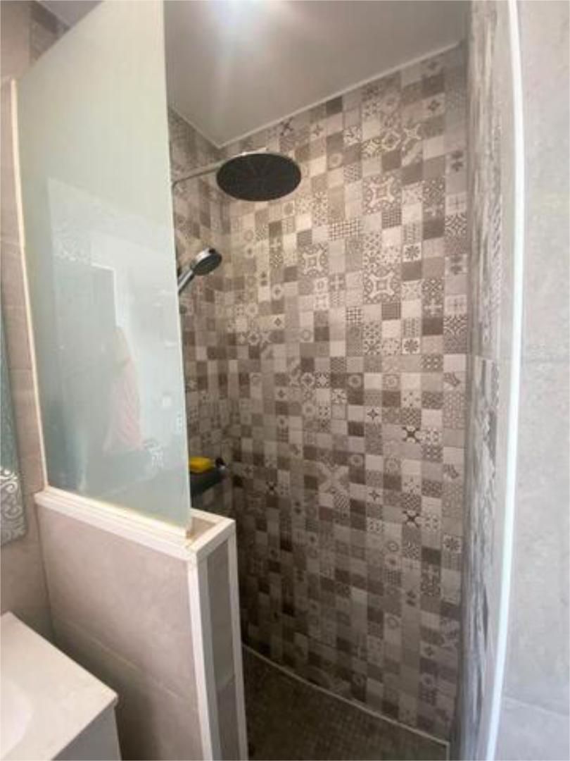 Bany de Apartament de lloguer en Chiclana de la Frontera amb Jardí privat i Es permeten mascotes