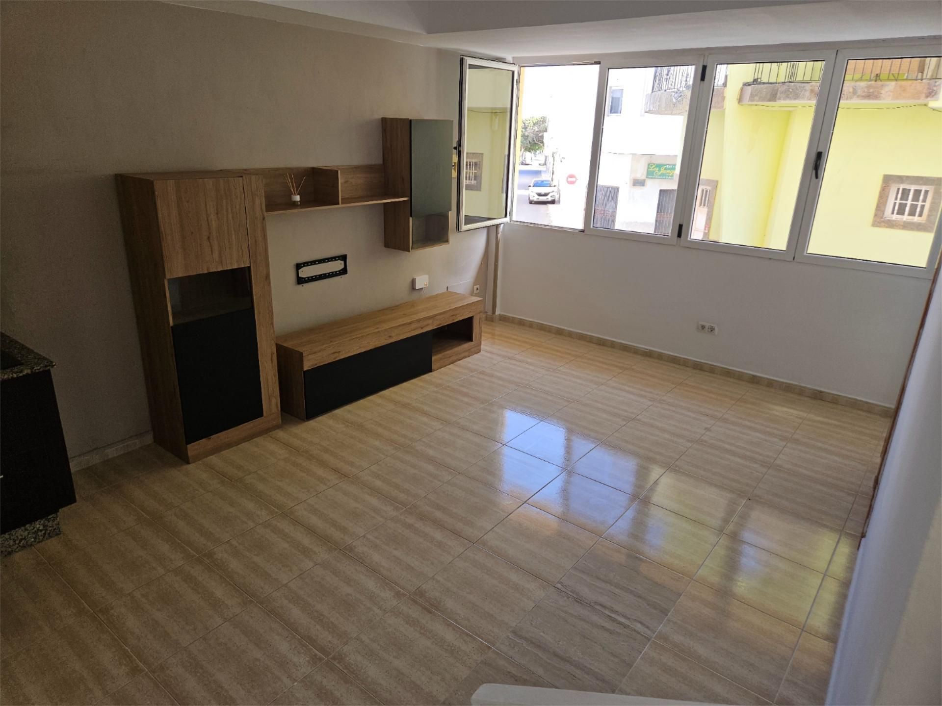 Sala d'estar de Pis en venda en Santa Lucía de Tirajana amb Traster, Moblat i Rentadora