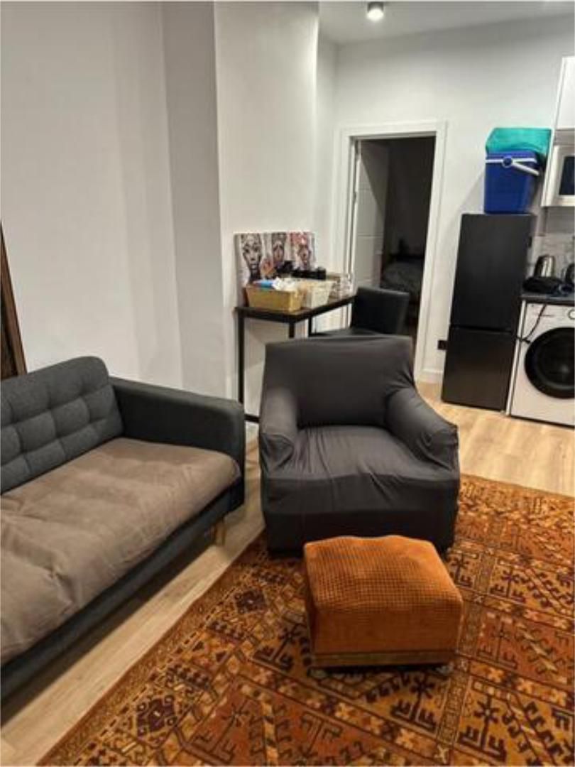 Sala de estar de Apartamento de alquiler en  Madrid Capital con Calefacción, Trastero y Amueblado