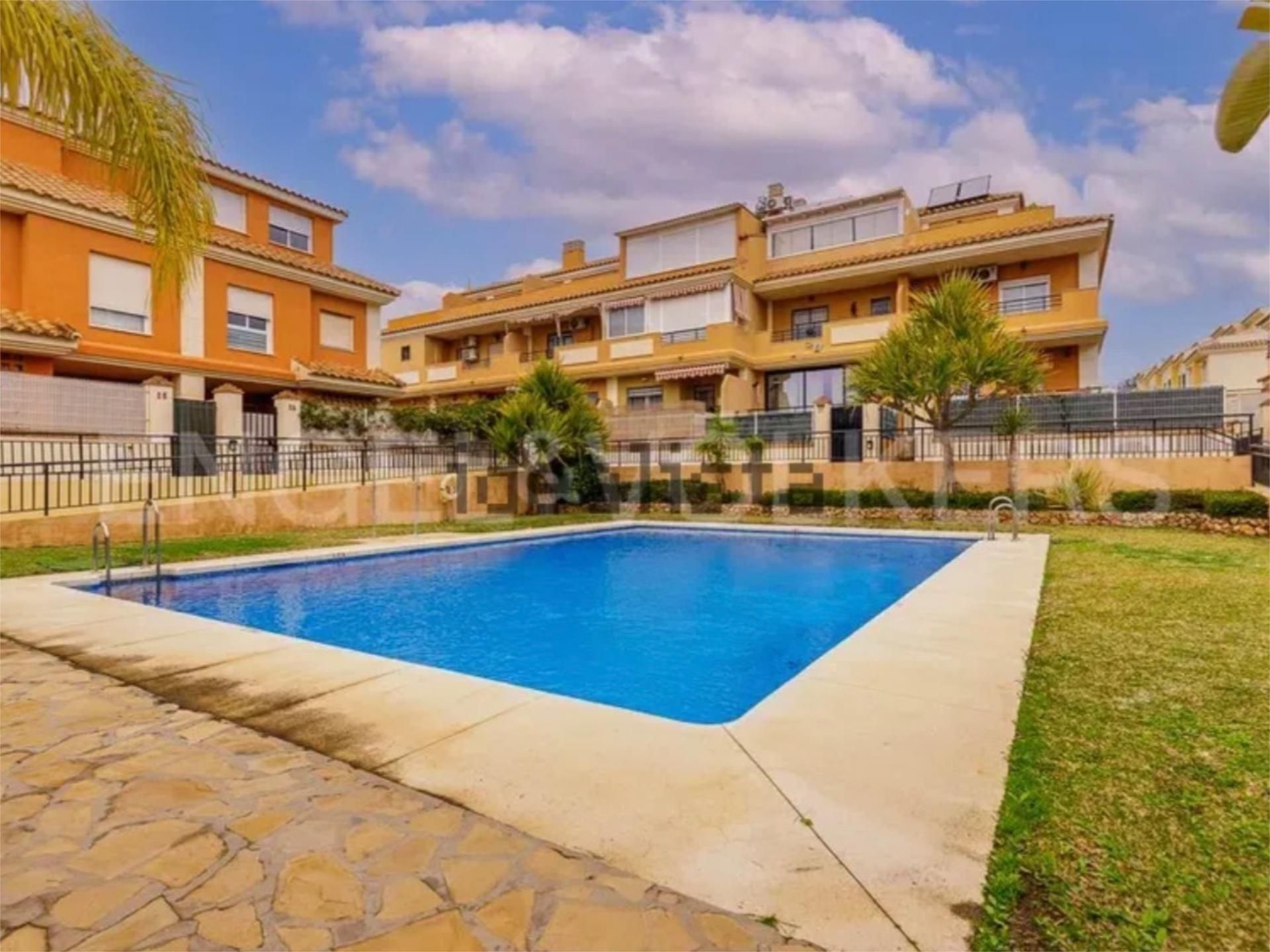 Exterior view of Single-family semi-detached for sale in Vélez-Málaga  with Air Conditioner, Terrace and Swimming Pool