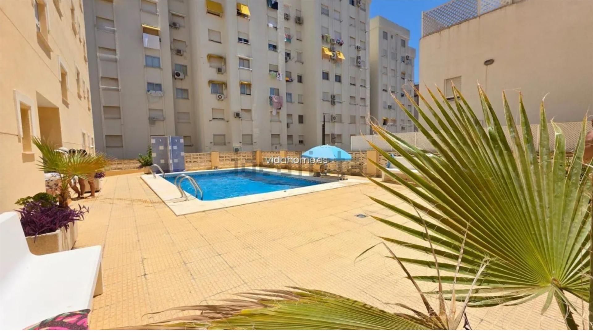Swimming pool of Planta baja for sale in Gandia  with Air Conditioner, Heating and Terrace
