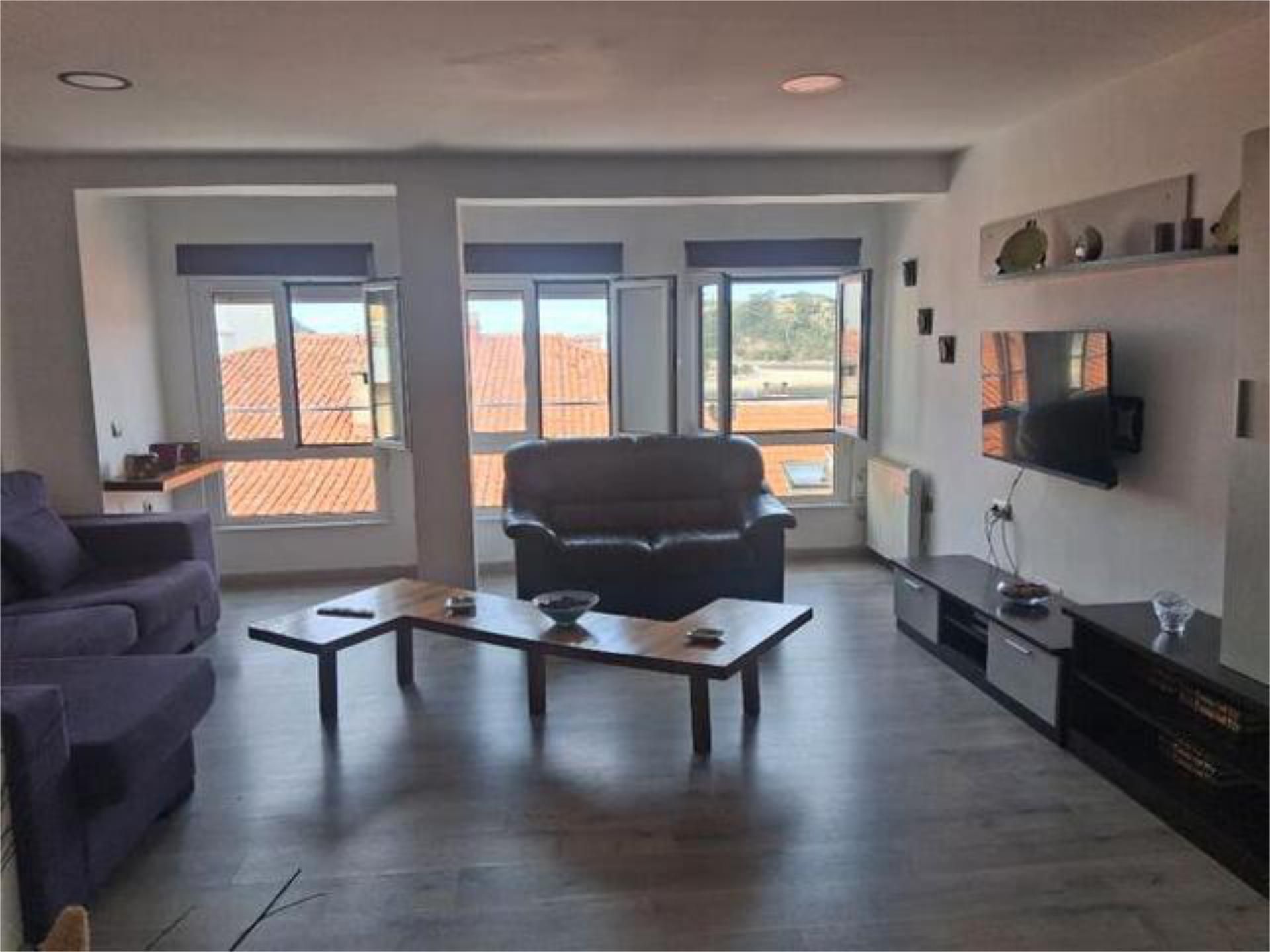 Sala d'estar de Apartament de lloguer en Ribadesella amb Calefacció i Moblat