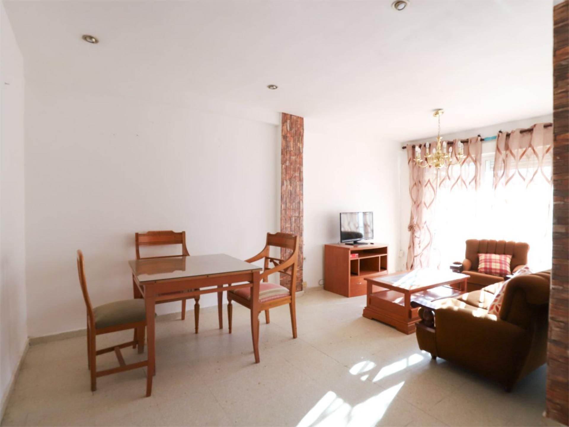 Living room of Flat for sale in  Granada Capital  with Air Conditioner, Private garden and Terrace