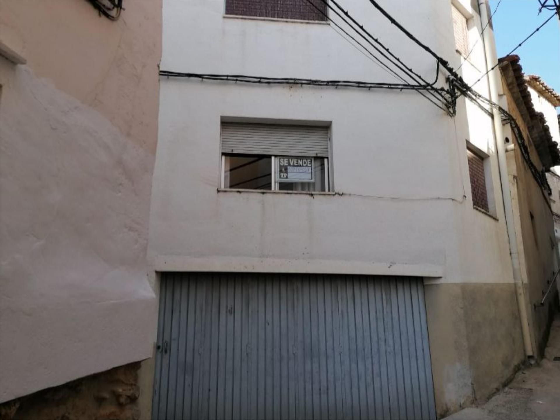 Vista exterior de Casa adosada en venda en Oliete amb Terrassa i Moblat