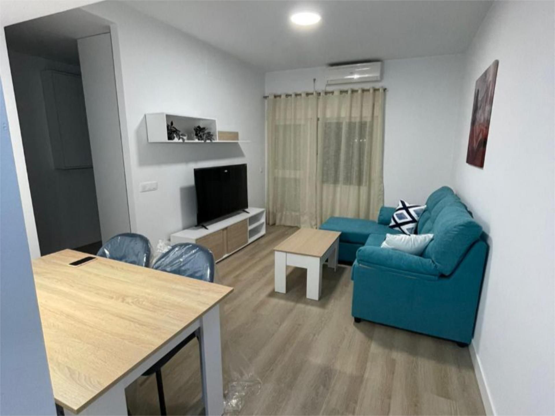 Living room of Flat to rent in La Rinconada  with Air Conditioner, Heating and Parquet flooring