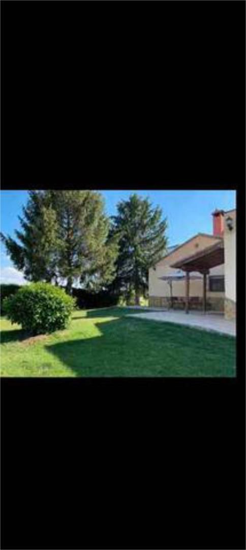 Jardí de Casa adosada en venda en Santa Cristina de la Polvorosa amb Calefacció, Jardí privat i Terrassa