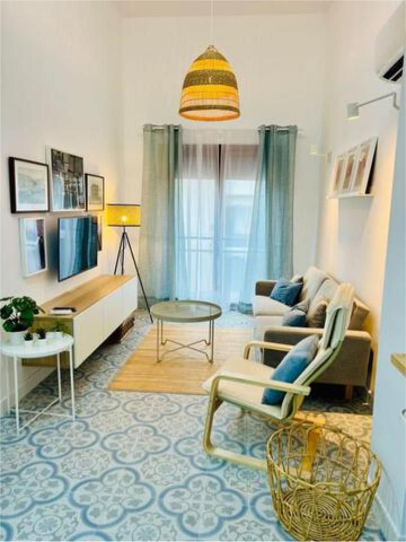 Sala d'estar de Apartament de lloguer en  Almería Capital amb Calefacció i Moblat