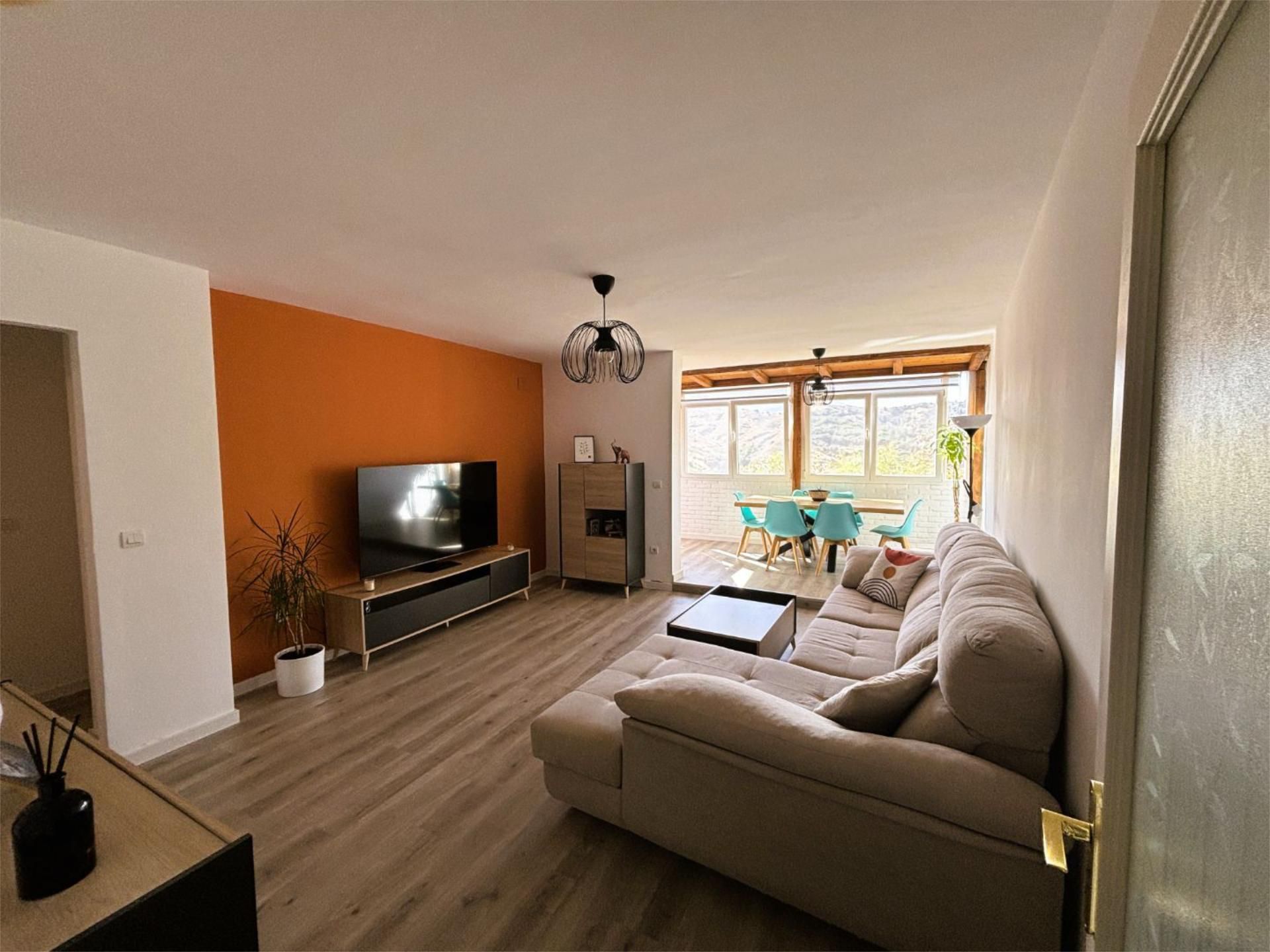 Sala de estar de Casa adosada en venta en Cenes de la Vega con Aire acondicionado, Jardín privado y Parquet