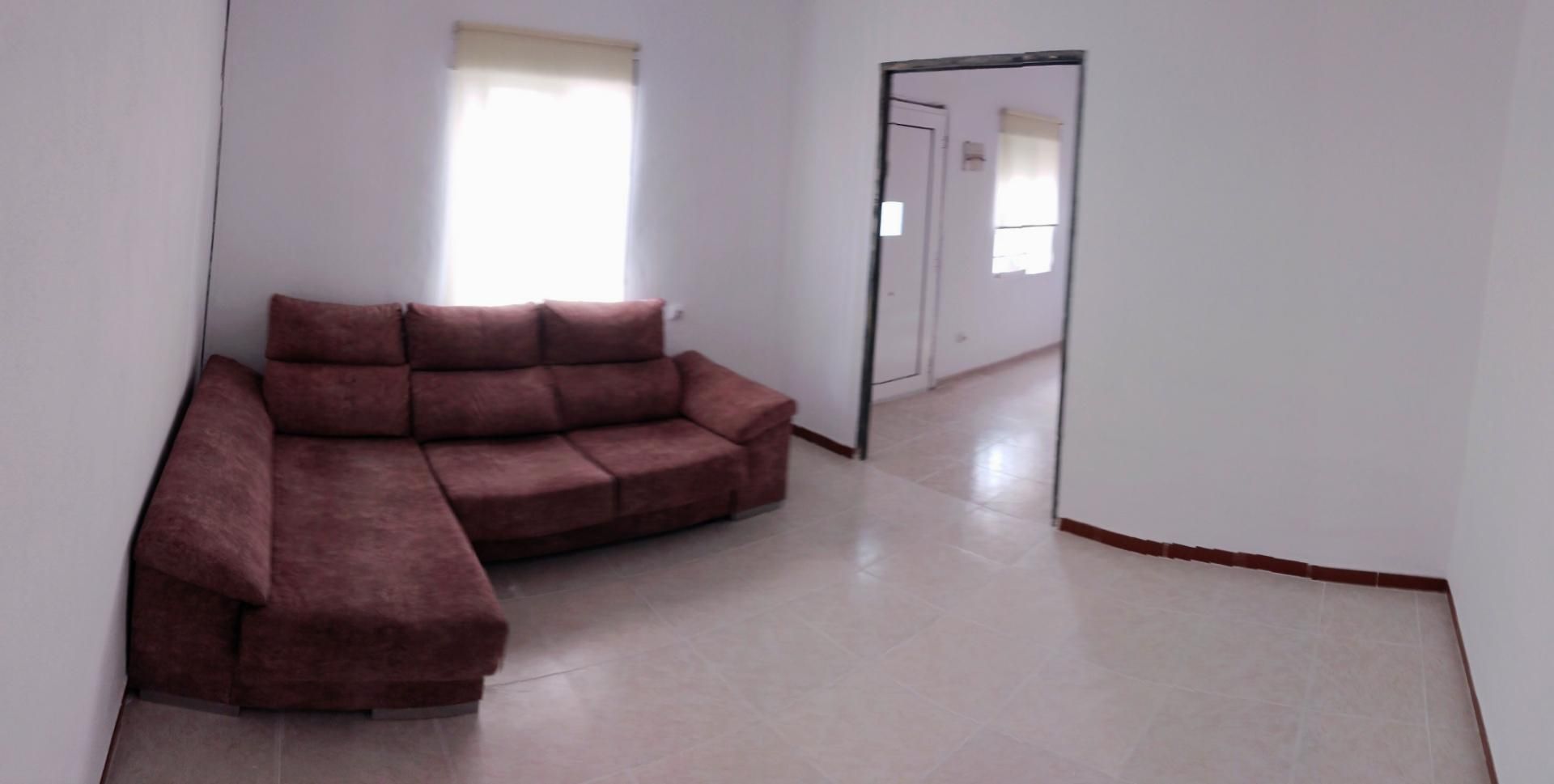 Sala d'estar de Casa adosada en venda en Cortes de la Frontera amb Terrassa, Rentadora i Balcó