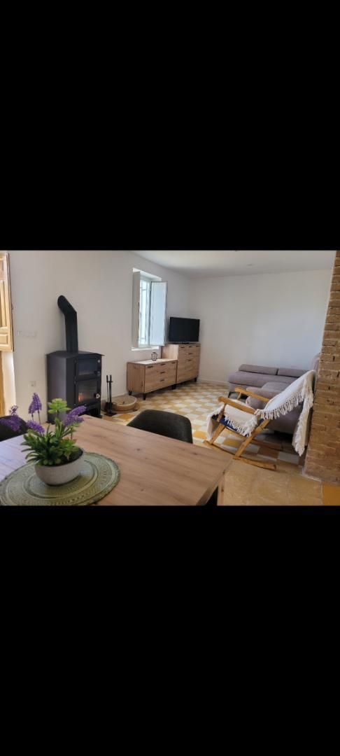 Sala d'estar de Casa adosada de lloguer en Cogollos de la Vega amb Calefacció, Moblat i Forn
