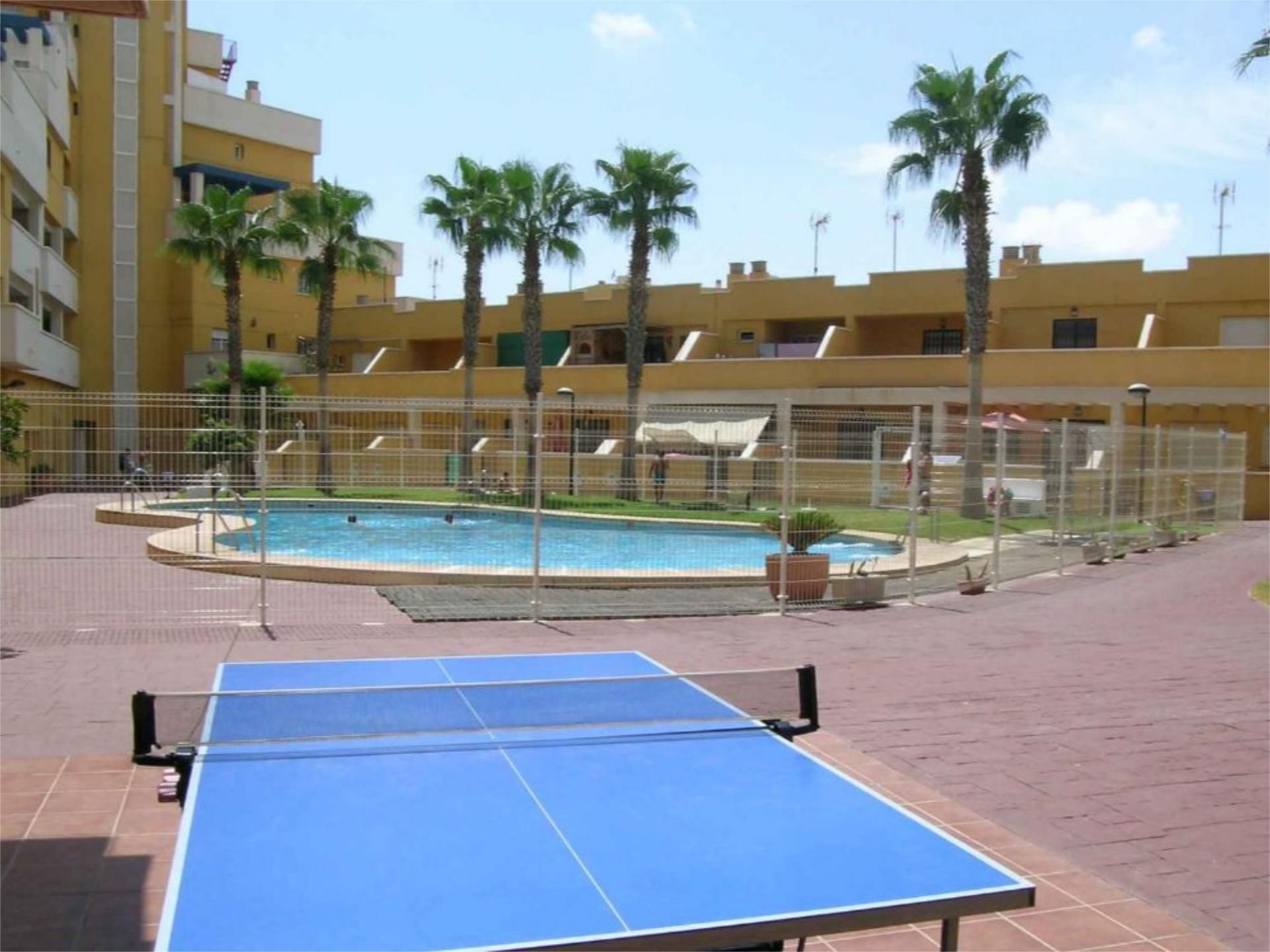 Swimming pool of Duplex for sale in Roquetas de Mar