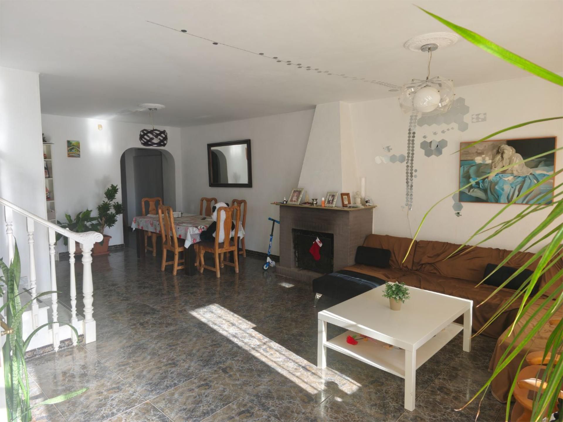 Sala de estar de Casa adosada en venta en Torremolinos con Aire acondicionado, Terraza y Piscina