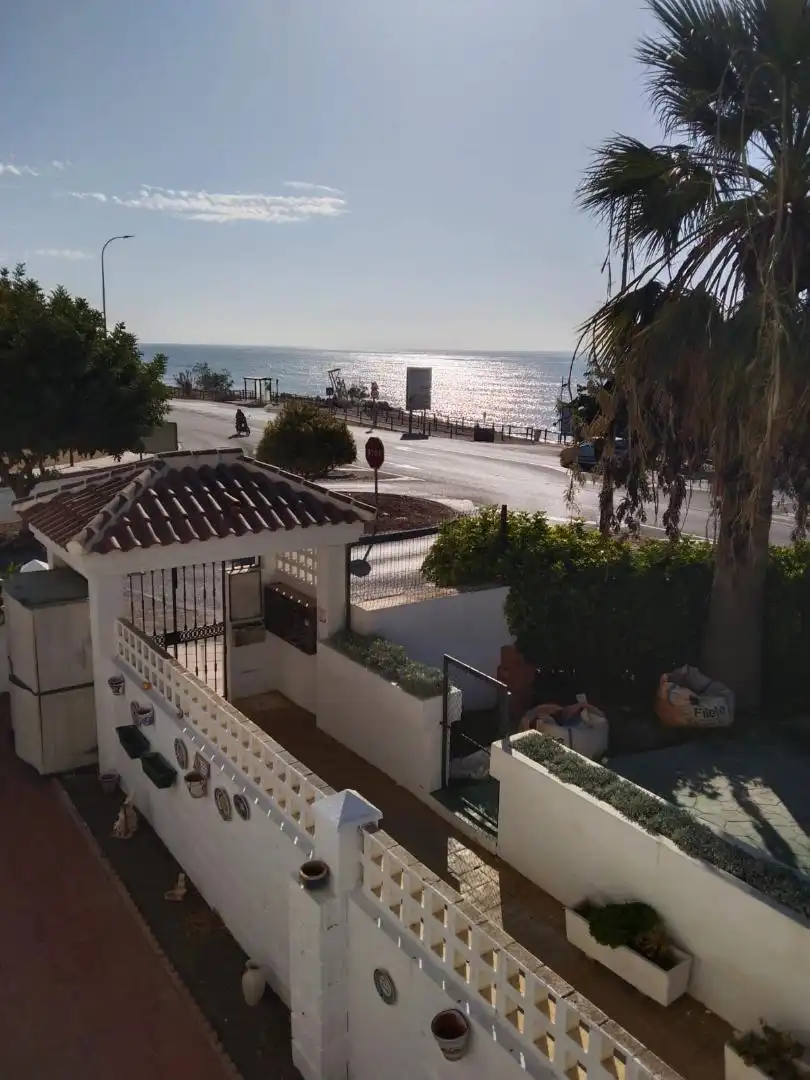 Casa adosada en venda a Avenida Brisa del Mar, 1, Chilches Vista exterior de Casa adosada en venda en Vélez-Málaga amb Aire condicionat, Jardí privat i Moblat