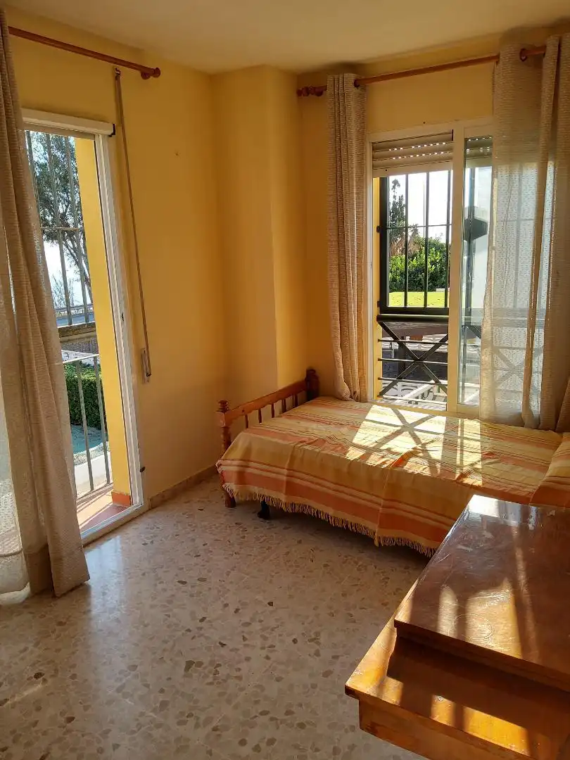 Casa adosada en venda a Avenida Brisa del Mar, 1, Chilches Dormitori de Casa adosada en venda en Vélez-Málaga amb Aire condicionat, Jardí privat i Moblat