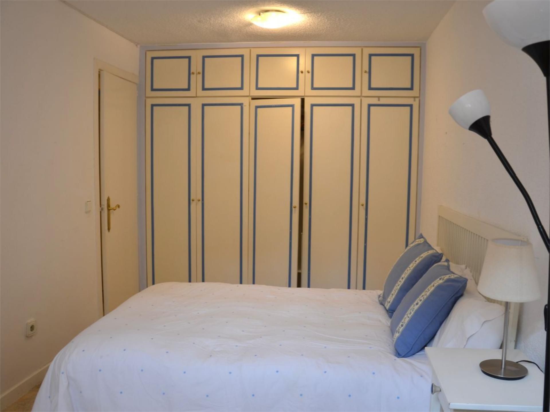 Bedroom of Flat to share in La Moraleja  with Heating, Parquet flooring and Swimming Pool