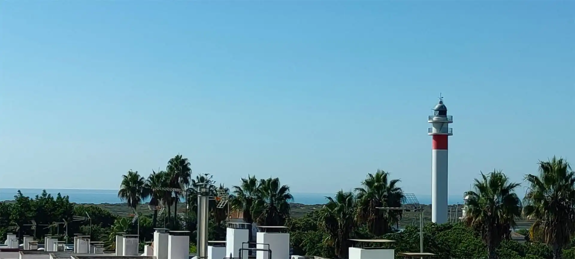 Dúplex de alquiler en Calle Puerto, 10, El Rompido Vista exterior de Dúplex de alquiler en El Rompido con Terraza, Piscina y Balcón