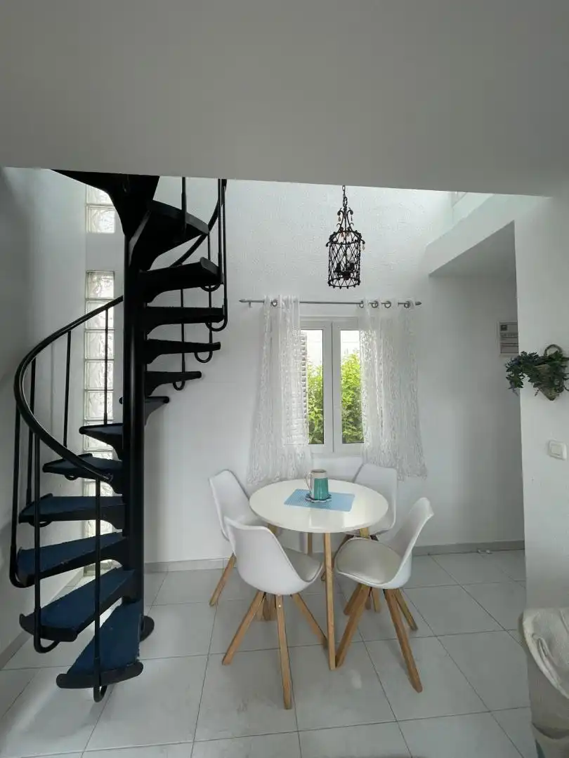 Dúplex de alquiler en Calle Puerto, 10, El Rompido Comedor de Dúplex de alquiler en El Rompido con Terraza, Piscina y Balcón
