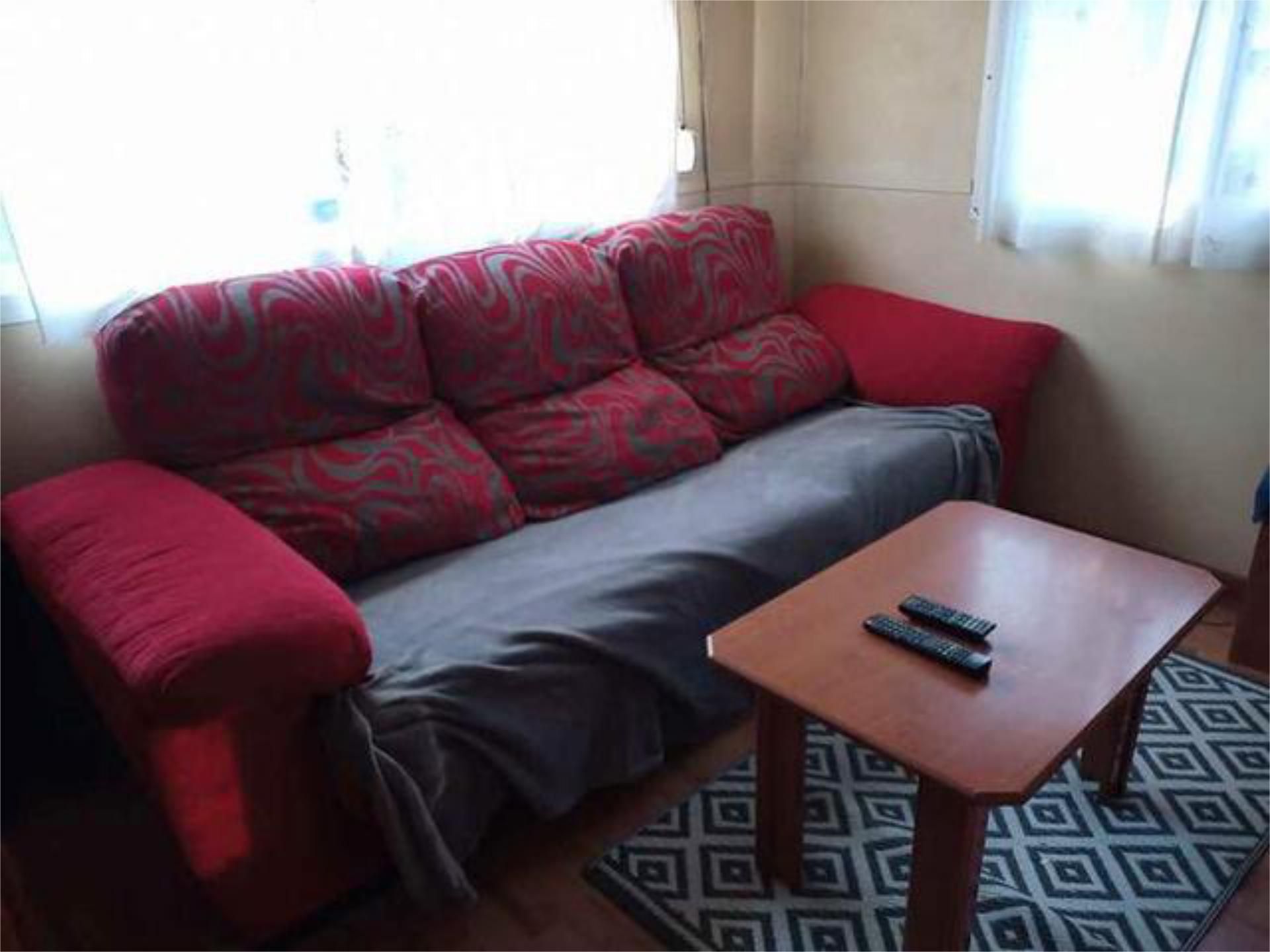 Sala d'estar de Casa o xalet en venda en Bareyo amb Jardí privat, Traster i Moblat